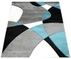 Tapis design moderne Motifs géométriques Contours découpés Voir les images du produit 8
