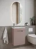 A modern bathroom vanity with a sink and cabinet, a mirror, and a toilet. Voir les images du produit