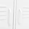 Close-up of two white cabinet doors with handles. Voir les images du produit