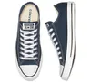 A top-down view of a pair of navy blue Converse All Star low-top sneakers, presented on a white background. Produktbild-Vorschau