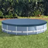 A round Intex pool covered with a blue tarp, situated on a grassy lawn. Produktbild-Vorschau