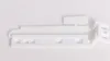 A white plastic hardware set for a refrigerator door is laid out on a white background. Produktbild-Vorschau