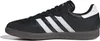 A side view of a black Adidas Samba shoe with white stripes and a brown sole. Náhled obrázku produktu