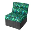 A single outdoor chair cushion set with a tropical leaf pattern. Náhľad obrázku produktu
