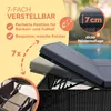 A close-up of a black rattan sun lounger with a gray cushion, showing its adjustable features and thick padding, with a pool in the background. Produktbild-Vorschau