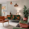 A modern living room with a sideboard, armchair, and sofa. Anteprima dell’immagine prodotto