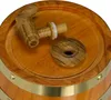 A close-up view of the top of a wooden barrel, showing a wooden spigot and a wooden stopper. Náhled obrázku produktu