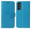 A blue flip phone case for a Samsung Galaxy A25 5G is shown, with one side open to reveal the phone's camera array and the other side displaying embossed floral and butterfly patterns. Produktbild-Vorschau