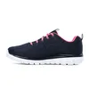 A side view of a navy and pink Skechers women's athletic shoe against a white background. Produktbild-Vorschau
