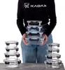 A person is holding a stack of glass food containers. Produktbild-Vorschau