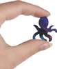 A hand holding a small octopus-shaped puzzle piece. Náhľad obrázku produktu