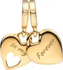 Two gold heart-shaped charms hanging from clasps. Produktbild-Vorschau
