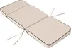 A beige chaise lounge cushion with dark brown piping, shown from a diagonal top-down view on a white background. Produktbild-Vorschau