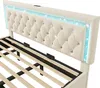 A close-up view of a beige upholstered bed frame with a tufted headboard and LED lighting. Náhled obrázku produktu