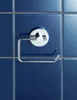 A chrome toilet paper holder mounted on blue tiled wall. Produktbild-Vorschau