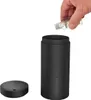 A hand is shown pouring liquid from a small bottle into a black diffuser. Náhľad obrázku produktu