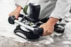 A person is using a Festool concrete grinder on a rough surface. Náhľad obrázku produktu