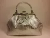A silver handbag with a floral pattern. Podgląd zdjęcia produktu