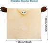 A wearable hooded blanket with sloth features, laid flat, showing its dimensions. Produktbild-Vorschau