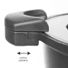A close-up view of a pot lid handle and the edge of a pot. Podgląd zdjęcia produktu