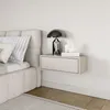 A bedroom scene with a bed and a floating nightstand. Anteprima dell’immagine prodotto