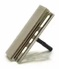 A stainless steel sink overflow cover with a black handle, shown at an angle on a white background. Produktbild-Vorschau