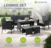 An outdoor lounge set with a sofa, chairs, table, and ottomans on a patio. Produktbild-Vorschau