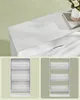 A close-up of a white cabinet with drawers, and two inset images showing a shoe rack with shelves. Produktbild-Vorschau