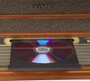 A close-up view of a CD player tray extended from a wooden stereo system. Náhled obrázku produktu