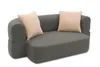 A gray sofa with two beige cushions on a white background. Produktbild-Vorschau