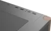 A close-up view of the top panel of a computer case, showing various ports and buttons, with a wood-grain accent on the corner. Voir les images du produit