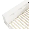 Close-up view of a white bed frame with wooden slats. Voir les images du produit