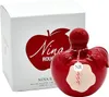 A red apple-shaped perfume bottle and its white box packaging. Produktbild-Vorschau