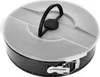 A round cake pan with a clear plastic lid and a black handle. Náhľad obrázku produktu