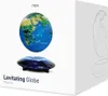 A levitating globe is shown on its magnetic base, with packaging visible on the right. Náhľad obrázku produktu