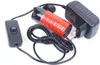 A product shot of an electrical pump with its accessories, including a power adapter and a switch, against a white background. Náhled obrázku produktu