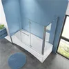 A bathroom scene featuring a bathtub with a glass shower enclosure and a blue rug on the floor. Produktbild-Vorschau