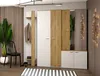 A modern entryway cabinet with a mirror and integrated shelving, featuring a plant and chair. Náhled obrázku produktu
