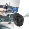 A split image showing a person using a dent puller on a car and a close-up of the dent puller's suction cup. Anteprima dell’immagine prodotto