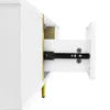 A close-up view of an open drawer on a white cabinet with gold accents. Produktbild-Vorschau