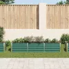 A garden scene with raised garden beds in front of a fence. Náhľad obrázku produktu