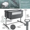 A product image showing a baby crib with dimensions and feature callouts. Produktbild-Vorschau