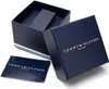 A Tommy Hilfiger watch box and its accompanying booklet, presented on a white background. Náhled obrázku produktu