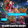A festive Christmas scene with children interacting with a smart speaker, while Santa Claus and reindeer are projected in the background. Voir les images du produit
