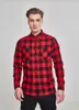 A man wearing a red and black checkered flannel shirt. Produktbild-Vorschau