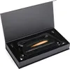 A black box with a black velvet interior holding a saw frame and a wooden handle. Produktbild-Vorschau