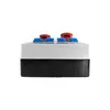 A side view of a black and white electrical distribution box with red and blue buttons on top. Náhled obrázku produktu