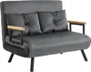 A dark gray sofa with two pillows and wooden armrests is shown against a white background. Podgląd zdjęcia produktu
