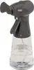 A close-up studio shot of a gray and clear spray bottle with a fan on top. Produktbild-Vorschau