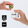Hands holding a small glass jar and its lid, with dimensions and weight indicated. Podgląd zdjęcia produktu